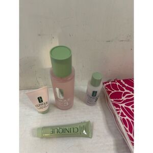 Clinque extremely cleaning lotion products with pink bag cosmetics open lot
